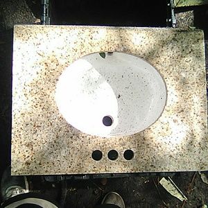 Granite bathroom countertop with porcelin sink